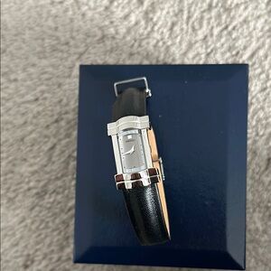 Seiko Black leather band , silver rectangular face , new batteries replaced